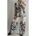Itāļu ražotāja NEW COLLECTION : Viegla ,brīvi krītoša auduma bikšu kostīms : ,izmērs universāls 42-44-46 ( piena balts + melni un pelēki toņi))