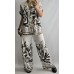 Itāļu ražotāja NEW COLLECTION : Viegla ,brīvi krītoša auduma kostīms : izmērs universāls 42-44-46 ( piena balts ar haki toni)